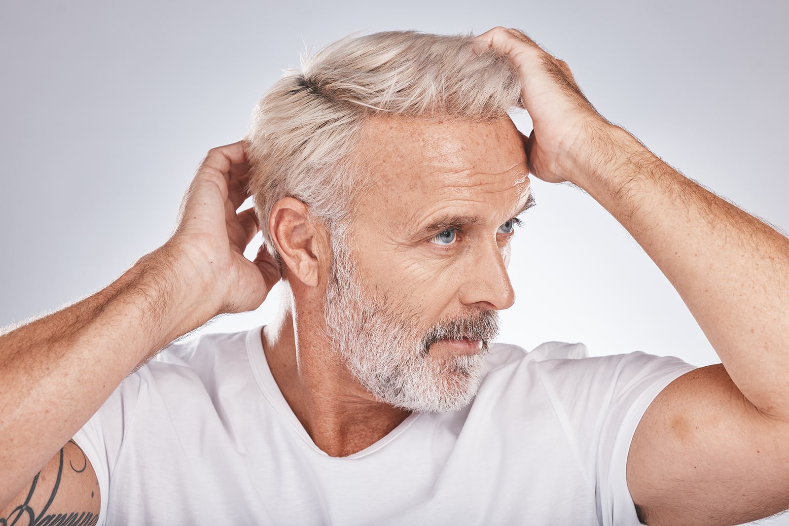 Older man with thinning hair