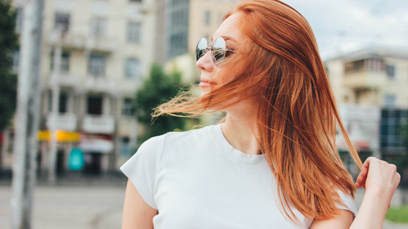 Beautiful Red Headed Woman With Hair Color in Houston