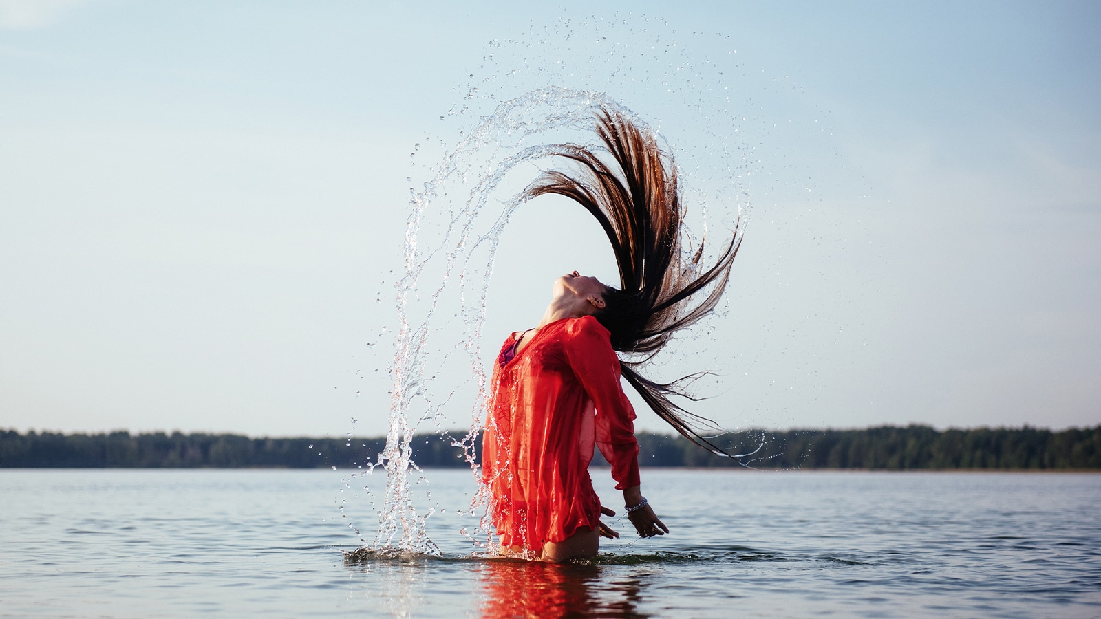 Featured image for “Effects of Swimming on Hair Color – How To Protect Your Hair Extensions”
